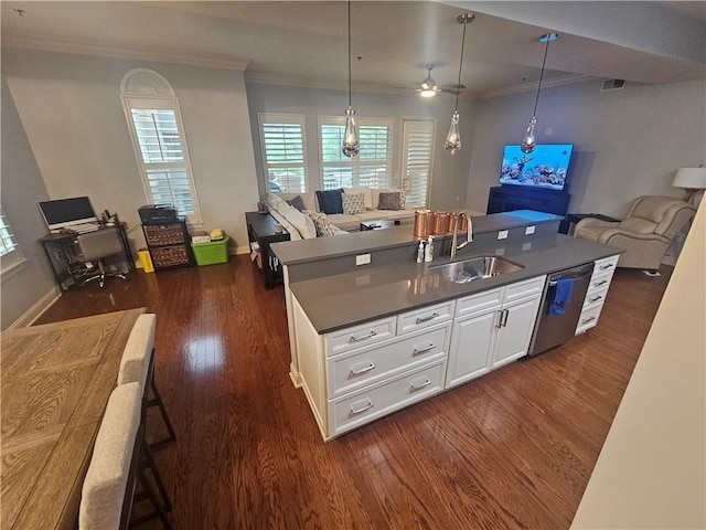 kitchen with ceiling fan, sink, white cabinets, and dark wood-type flooring