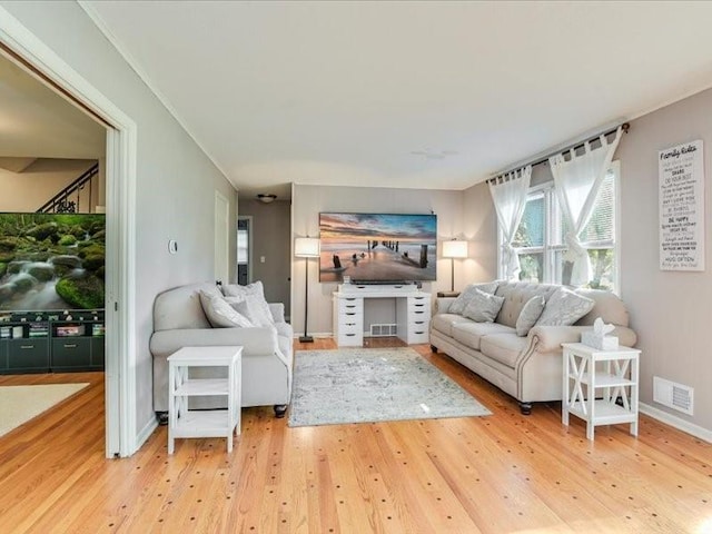 living room with hardwood / wood-style flooring