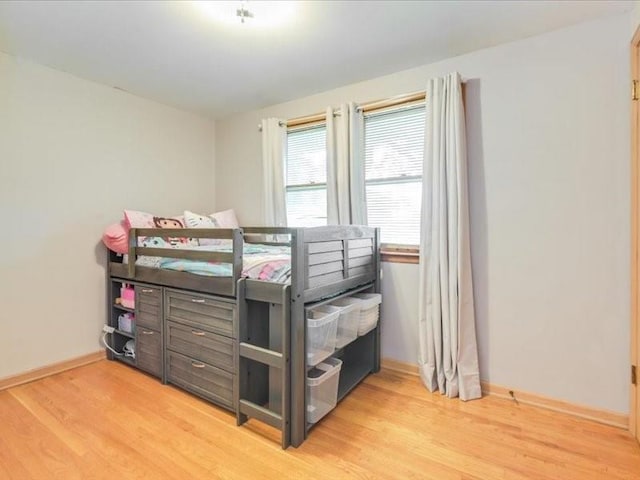 bedroom featuring hardwood / wood-style floors