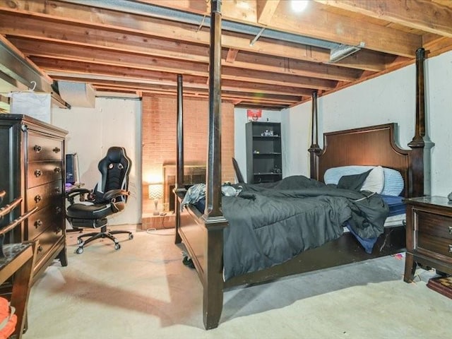 bedroom featuring concrete floors