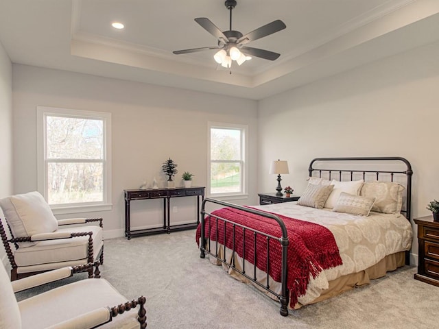 12435 Appaloosa St, Platte City, MO 64079 - bedroom with light carpet, a raised ceiling, ornamental molding, recessed lighting, and ceiling fan