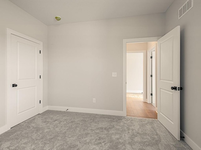12435 Appaloosa St, Platte City, MO 64079 - empty room with carpet floors and baseboards