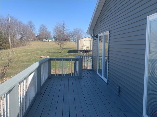 wooden deck with a yard