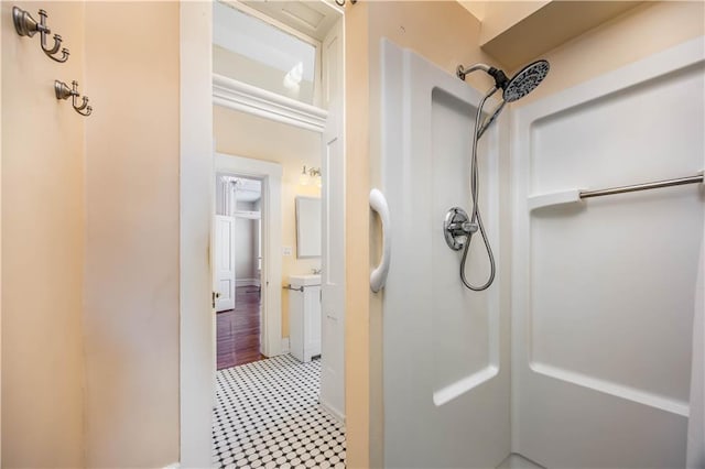 bathroom with vanity and walk in shower