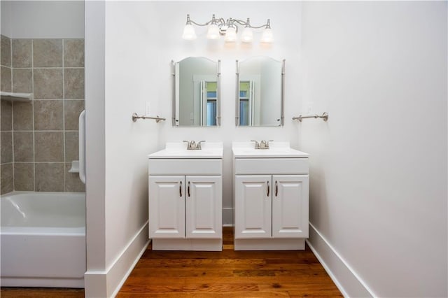 bathroom featuring vanity and hardwood / wood-style floors