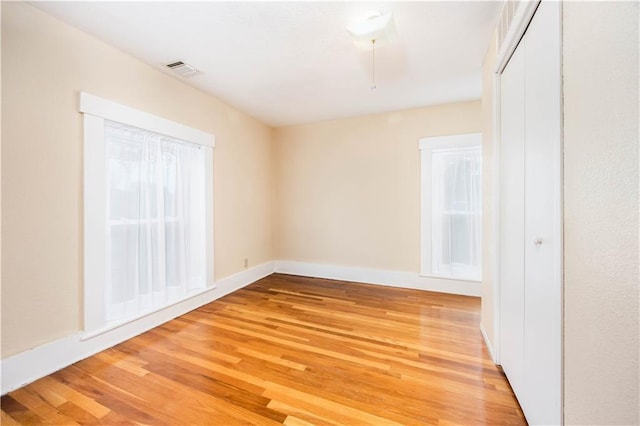 empty room featuring hardwood / wood-style floors