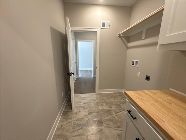 12710 NW Bittersweet Dr, Platte City, MO 64079 - laundry room with electric dryer hookup, cabinet space, washer hookup, baseboards, and visible vents