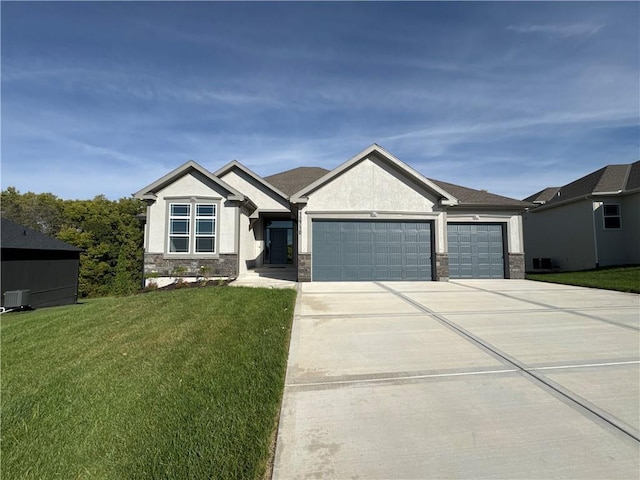 12710 NW Bittersweet Dr, Platte City, MO 64079 - ranch-style house with stucco siding, a garage, driveway, stone siding, and a front lawn