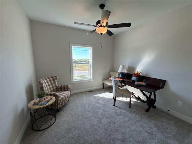 office area with ceiling fan and carpet flooring