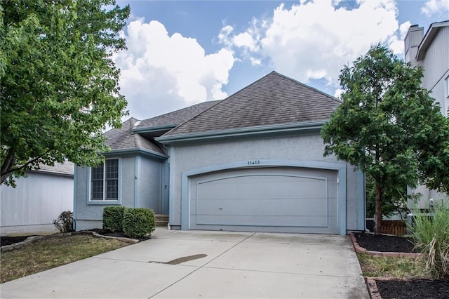 ranch-style home with a garage