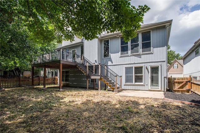 rear view of house with a deck