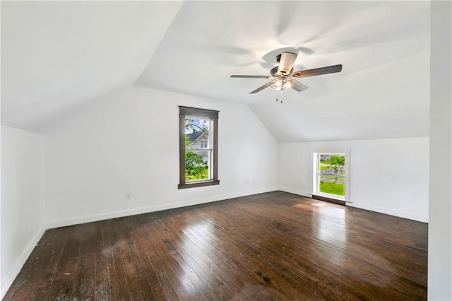 additional living space with dark hardwood / wood-style flooring, ceiling fan, and lofted ceiling