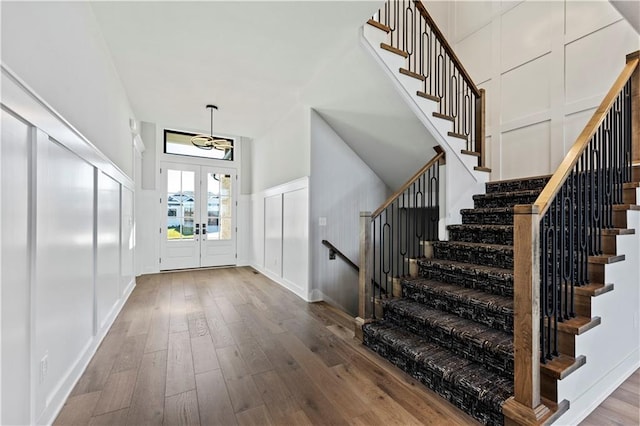 foyer entrance featuring wood-type flooring