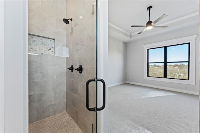 bathroom featuring walk in shower, ornamental molding, and ceiling fan