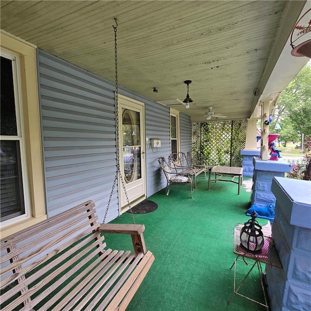 view of patio featuring a porch and ceiling fan