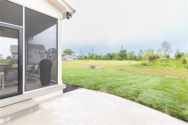 view of yard with a patio area