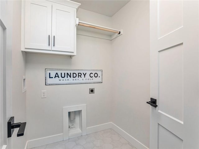 clothes washing area featuring cabinets, hookup for an electric dryer, and hookup for a washing machine