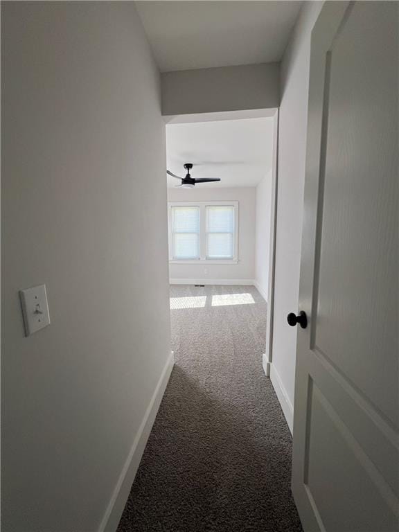 corridor with carpet floors