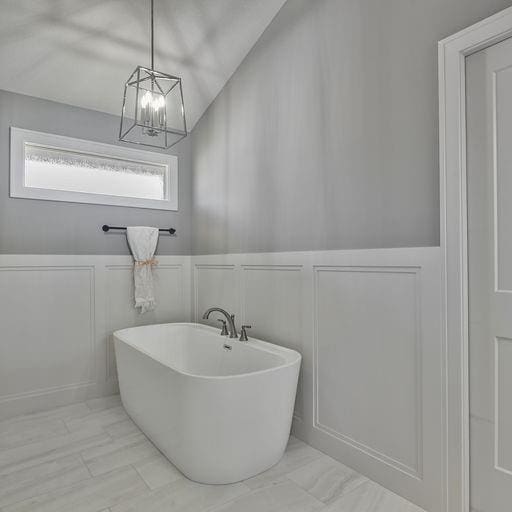 bathroom featuring a chandelier