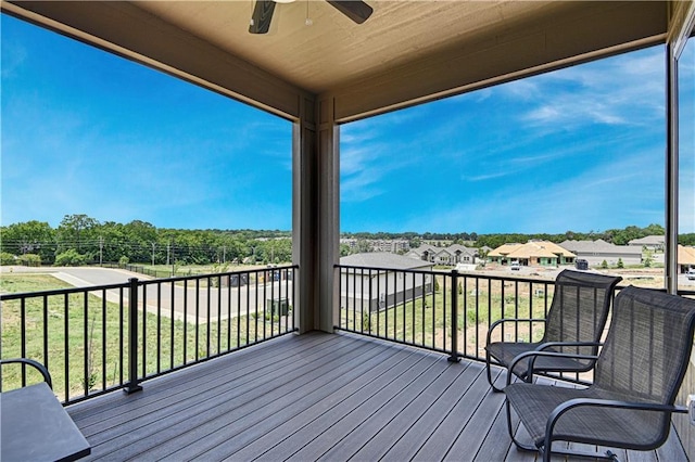 13028 S Constance St, Olathe, KS 66062 - deck featuring ceiling fan and a residential view