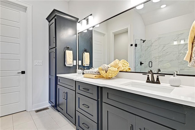 13028 S Constance St, Olathe, KS 66062 - bathroom with double vanity, a shower stall, and tile patterned flooring