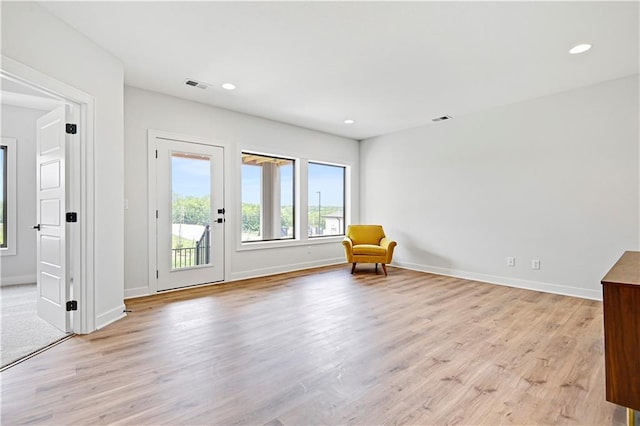 13028 S Constance St, Olathe, KS 66062 - unfurnished room featuring light wood-style flooring and recessed lighting