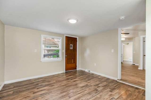 foyer entrance featuring hardwood / wood-style floors