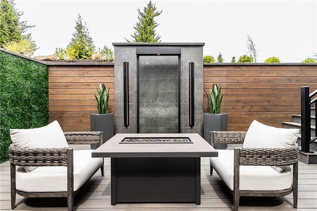 view of outbuilding featuring a fire pit