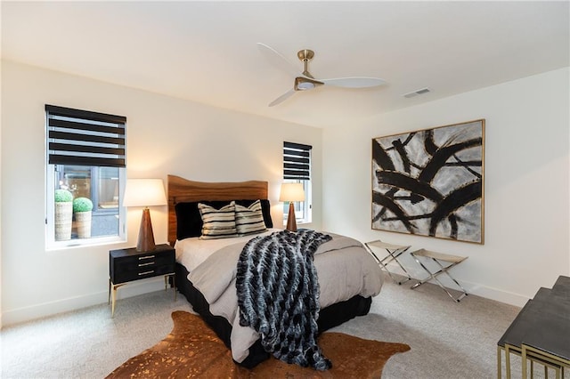 bedroom featuring ceiling fan and carpet flooring