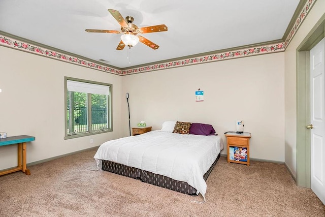 bedroom featuring ceiling fan and carpet flooring