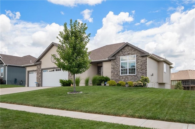 view of front of property featuring a garage and a front yard