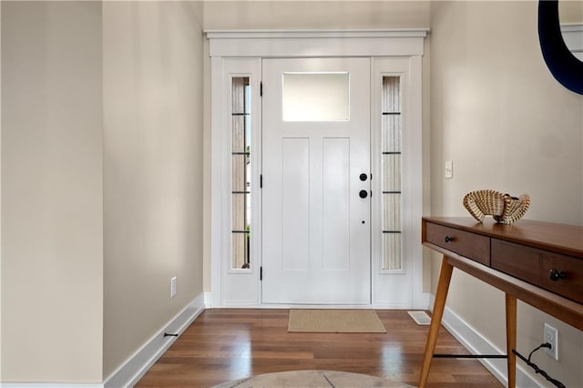 foyer entrance with hardwood / wood-style flooring