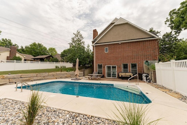 view of pool with a patio area