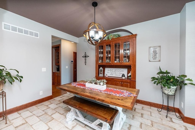 dining area with a chandelier