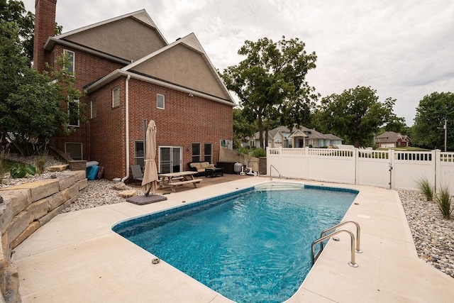 view of pool with a patio