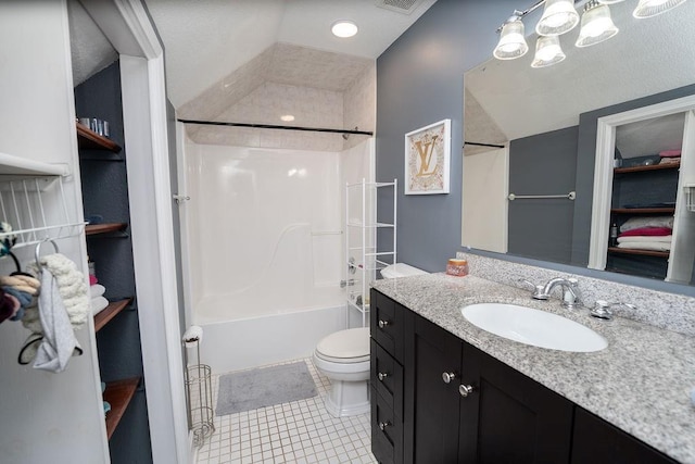 full bathroom featuring shower / bathing tub combination, lofted ceiling, tile patterned flooring, vanity, and toilet