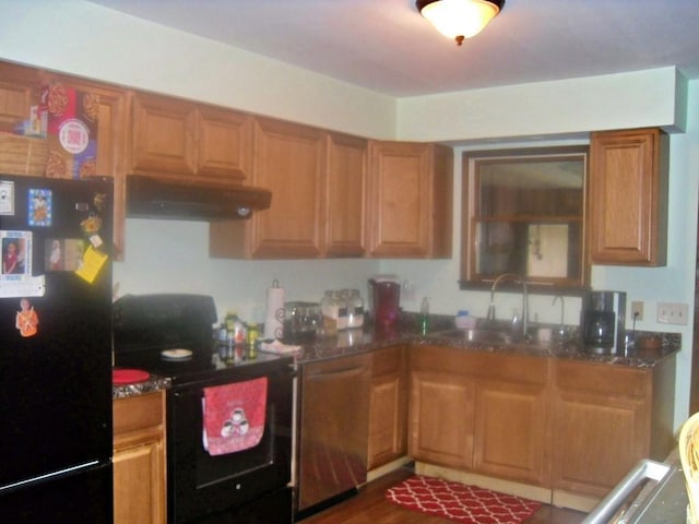 kitchen featuring sink and black appliances