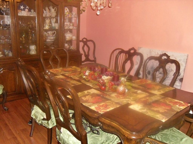 dining room with hardwood / wood-style flooring