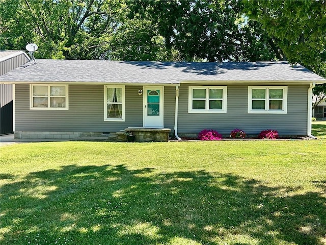 single story home featuring a front yard