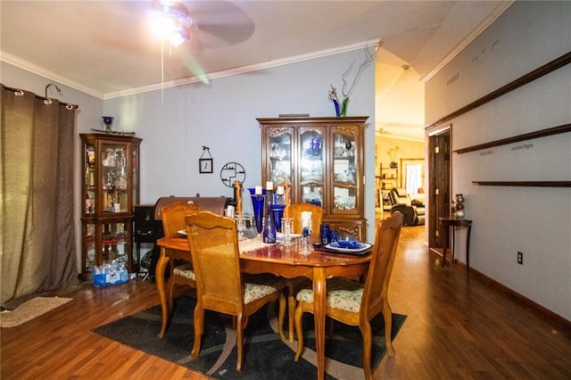 dining space with hardwood / wood-style floors, ornamental molding, and ceiling fan