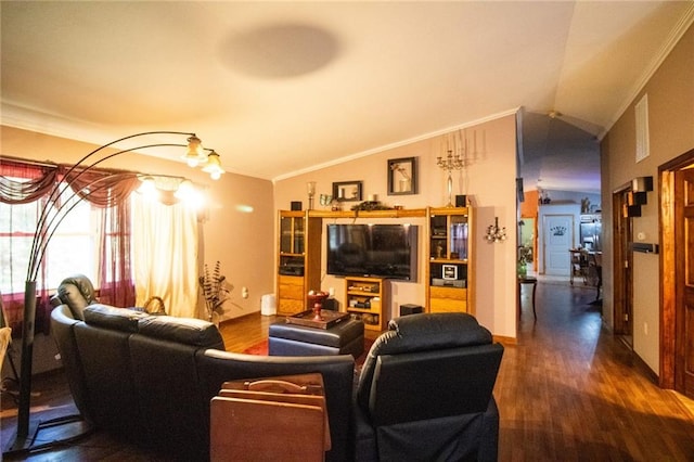 living room with vaulted ceiling, crown molding, and hardwood / wood-style flooring