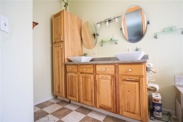 bathroom featuring tile flooring, double sink, and large vanity