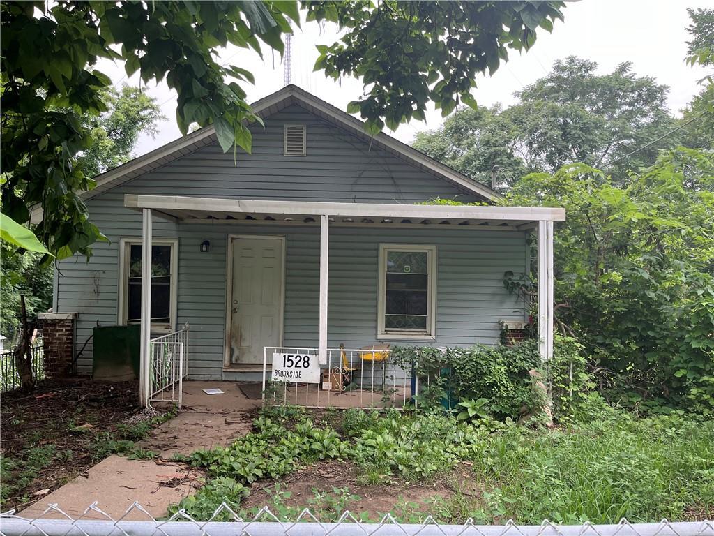 bungalow-style home with a porch