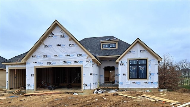 property in mid-construction featuring a garage