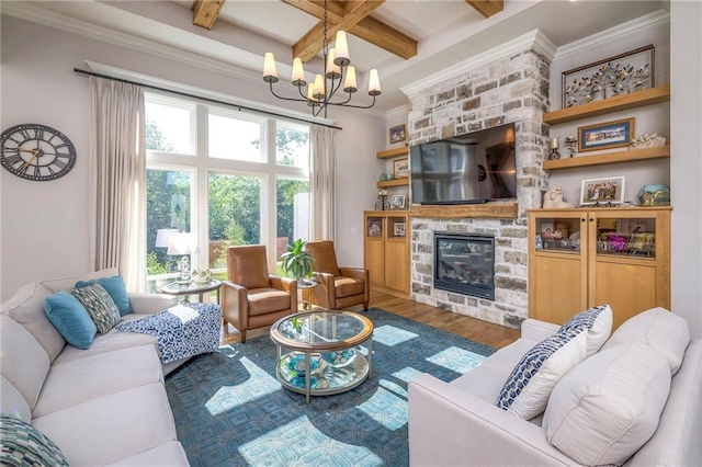 living room with beamed ceiling, a fireplace, dark hardwood / wood-style floors, and a wealth of natural light