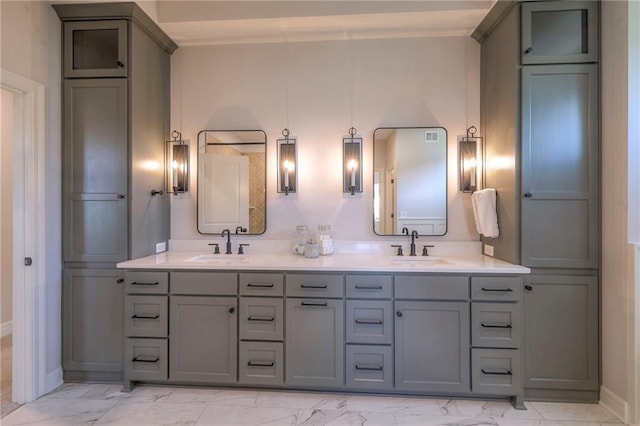 bathroom with double sink vanity and tile patterned flooring