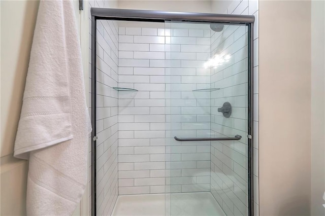 bathroom featuring an enclosed shower