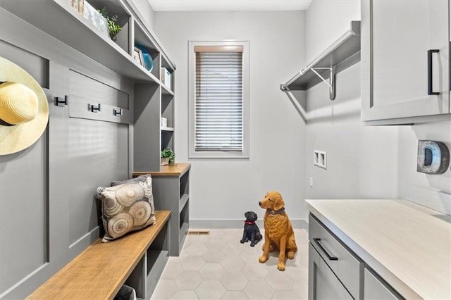 6101 NW 58th St, Kansas City, MO 64151 - mudroom with light tile patterned flooring and baseboards