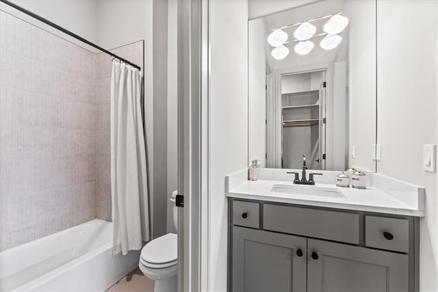 6101 NW 58th St, Kansas City, MO 64151 - full bathroom featuring toilet, vanity, and shower / bath combo