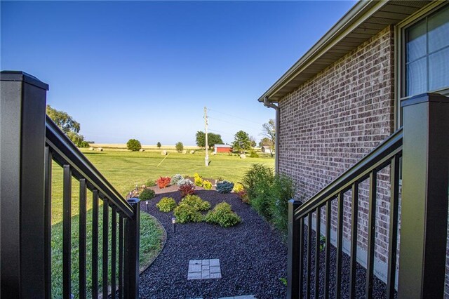 view of yard featuring a balcony